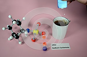 Molecule model of E952 Sodium Cyclamate an artifical sweetener with associated usage sample. White is Hydrogen, black is Carbon,