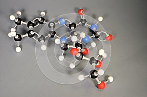 Molecule model of Vitamin B2. White is Hydrogen, black is Carbon, red is  Oxygen,  White is Hydrogen, black is Carbon, red is