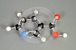 Molecule model of Vitamin B3. White is Hydrogen, black is Carbon, red is  Oxygen,  White is Hydrogen, black is Carbon, red is