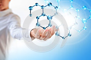 Molecules in the hand, Molecular medical abstraction in the hand. Molecule and atoms abstract background. Medical