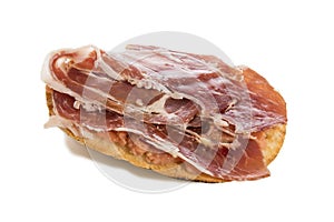 Mollete with jamÃ³n ibÃ©rico and tomato, spanish food, isolated on white