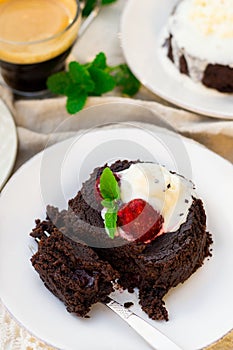 Molten chocolate cake fondant with vanilla ice cream for dessert