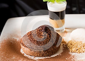 Molten chocolate cake with peanut butter shooter.