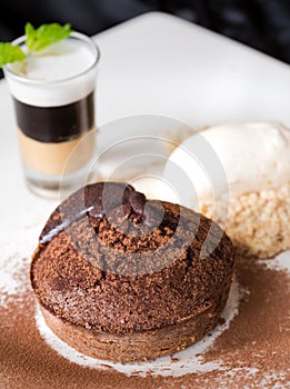 Molten chocolate cake with peanut butter shooter.