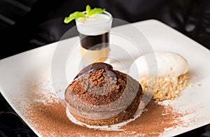 Molten chocolate cake with peanut butter shooter.