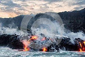 Molten lava flowing into the Pacific Ocean