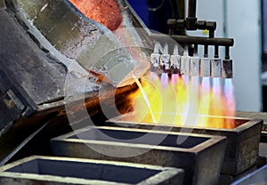 Molten Silver Poured Into Ingots