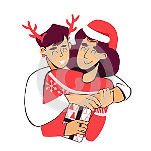 Mom and adult daughter hug for christmas or new year and exchange gifts. Santa hat, deer horns, sweater with snowflakes