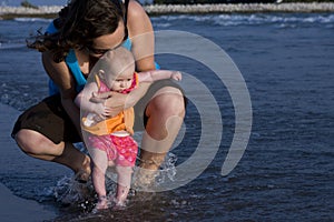 Mom and Baby Dipping Toes at Beach