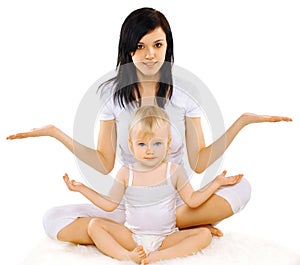 Mom and baby doing exercise, gymnastics, yoga, fitness