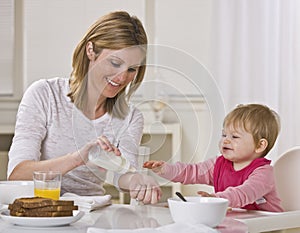 Mom and Baby Eating Breakfast