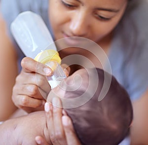 Mom, baby and feeding milk from bottle for nutrition, health and wellness. Formula, newborn and mother feed child for