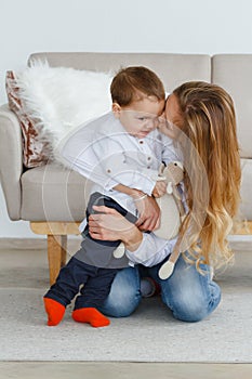 Mom and baby having fun at home