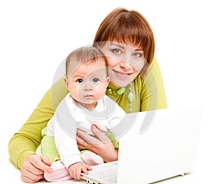 Mom and baby working at netbook