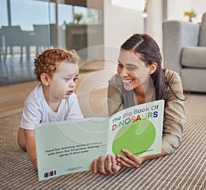 Mom, child and reading dinosaur books on living room floor at family home for educational fun, learning and happy