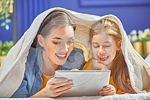 Mom and child with tablet