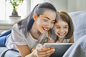 Mom and child with tablet