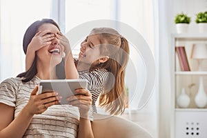 Mom and child with tablet