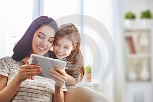 Mom and child with tablet