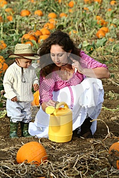 Mom and Child with Watering Can