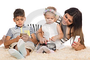 Mom and children with smartphones