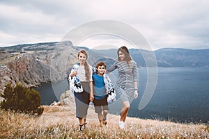 Mom with children walking outdoor