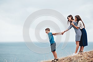 Mom with children walking outdoor