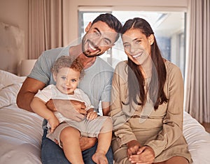 Mom, dad and baby on bed with smile in room together at home in Miami. Parents, bedroom and happy child bonding in