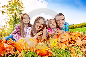 Mom dad and daughters in autumn portrait