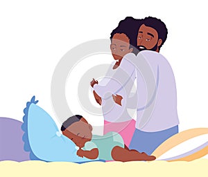 mom and dad taking care baby in bed