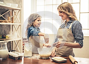 Mom and daughter baking