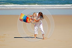 Mom, daughter, beach fun