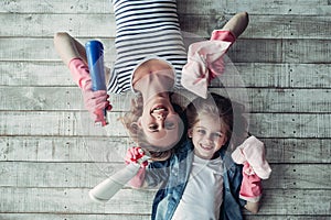 Mom with daughter doing cleaning