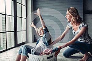 Mom with daughter doing cleaning