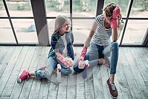 Mom with daughter doing cleaning