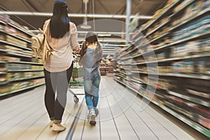 Mom and daughter doing shopping