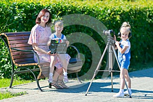 Mom and daughter in the filming of the video