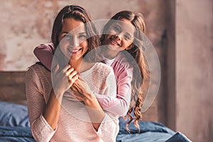 Mom and daughter at home