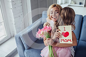 Mom and daughter at home