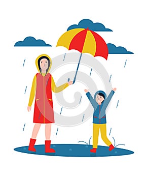 Mom and daughter in the rain, umbrella photo