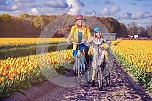 Mom and daughter riding bikes