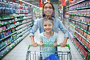 Mom and daughter in the supermarket