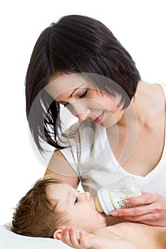 Mom feeding baby from bottle