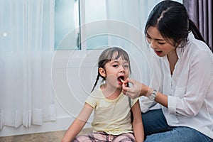 Mom feeding kids with potato chip. Teacher feeding student with