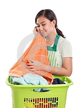 Mom feels the softness of her laundry work