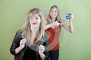 Mom Gestures To Destroy Credit Card photo