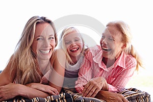 Mom, grandmother and daughter in portrait with smile in outdoors for bonding, laughing and child development. Mother