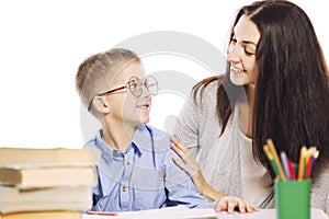 Mom helps her son to do homework, isolated on a white background. Tenderness, love