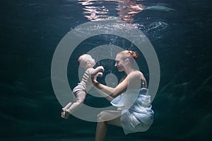 Mom and her baby are under water.