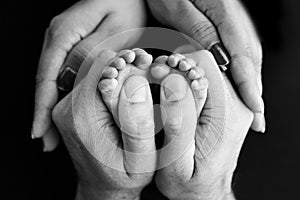 Mom and her child. Black and white image of motherhood stock photo.